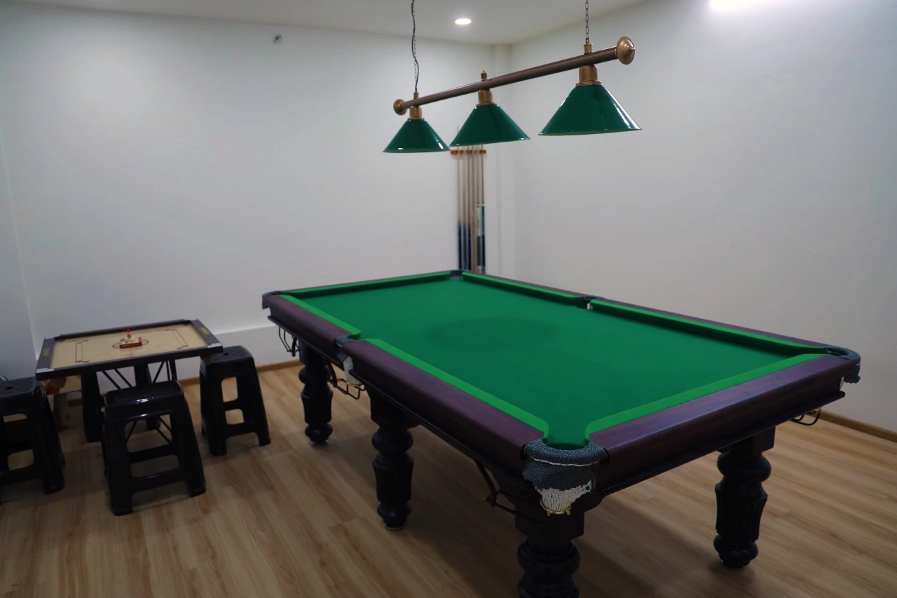 billiards room in club house of under the blue sky luxury villa in trivandrum